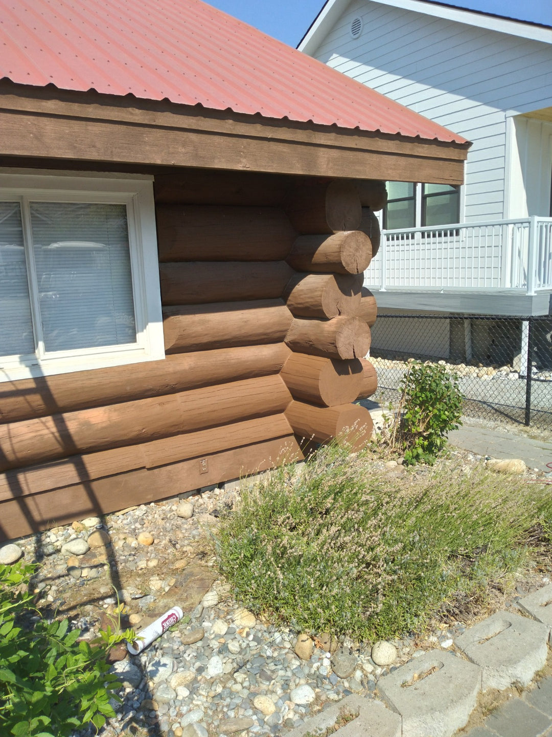 BROWN COATED LOG HOME