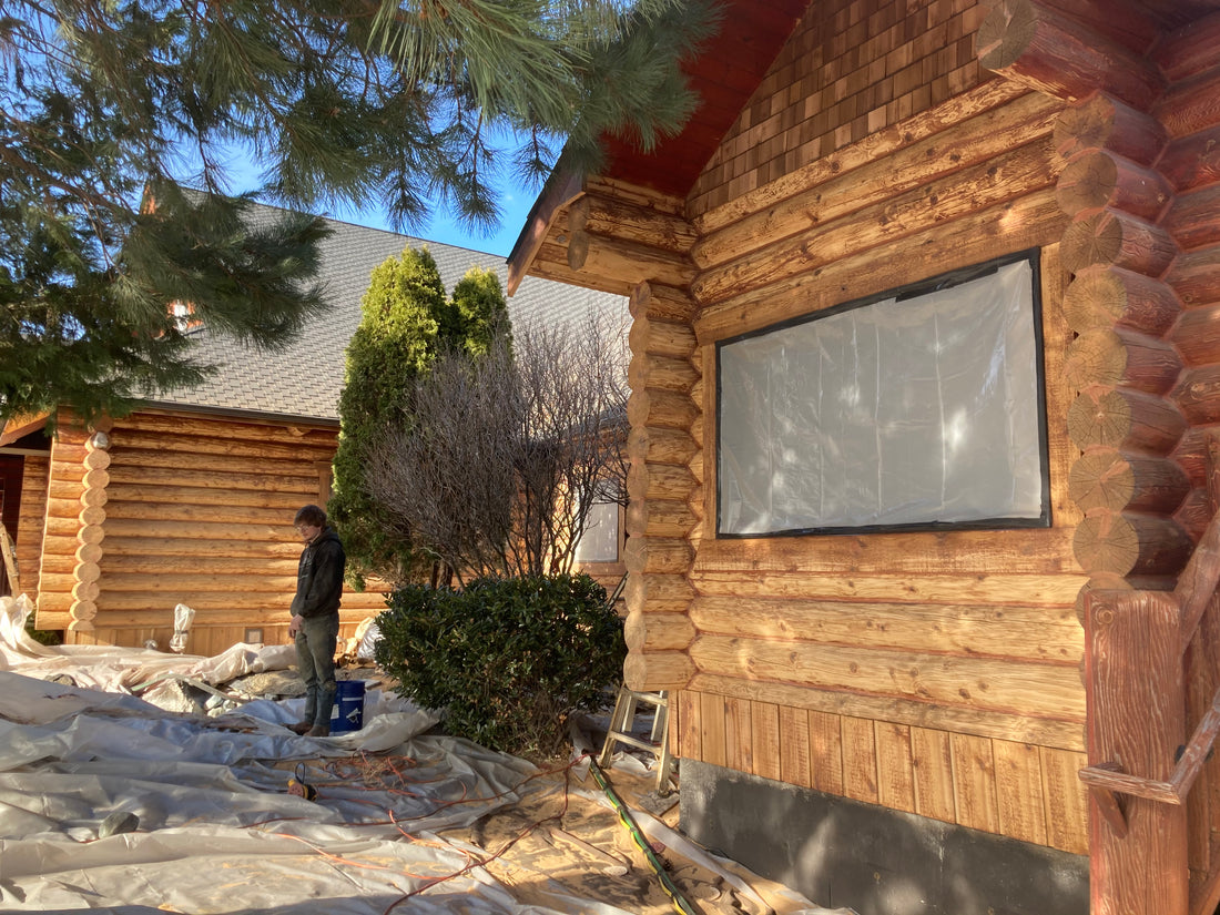 BLASTING A LOG HOME AND POWDERCOATING RAILINGS