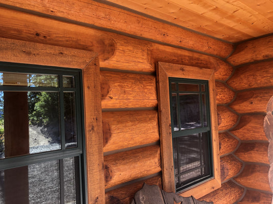 How do I choose a wood stain for my log cabin or timber home?